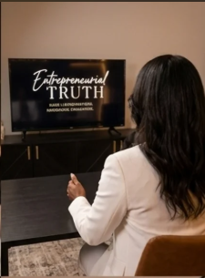 Kesi Case reviewing the Entrepreneurial Truth title card in studio